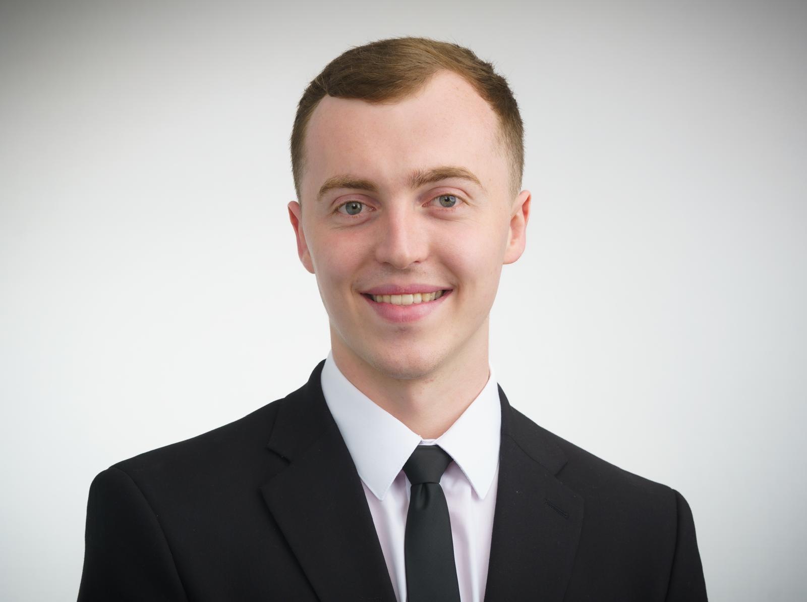 Professional headshot of Benjamin Keane